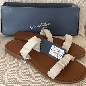 New Size 9 woman’s slip on sandals off white with tags